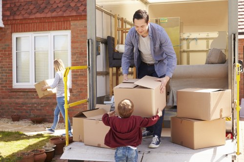Professional furniture pick-up in Brookgreen removing a large sofa