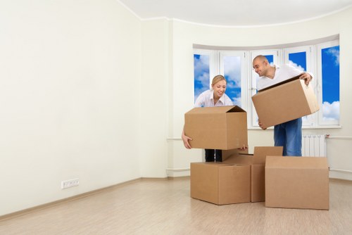 Commercial moving team handling office furniture and equipment during a Brookgreen relocation