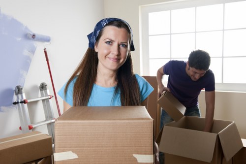 Local Brookgreen removals team handling furniture during a house move