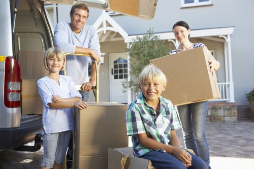 Packed moving boxes labeled for house removals in Brookgreen
