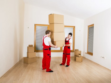 Careful piano moving process in a Brookgreen property