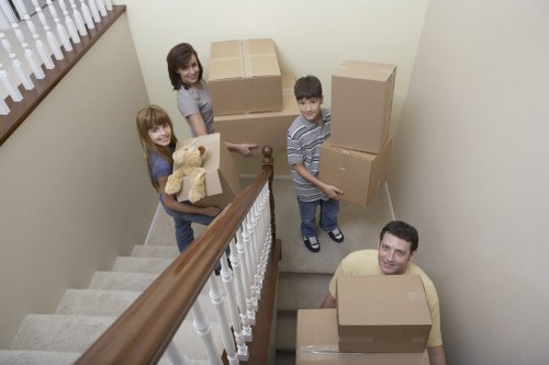Professional movers planning access and loading for a Brook Green relocation